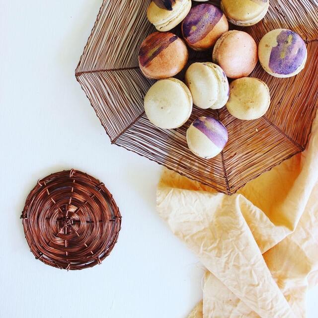 Copper honeycomb plate paired with homemade macarons and honey coloured linen napkins